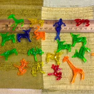 Vintage 1” plastic toys. Various animals including mermaids and giraffes.